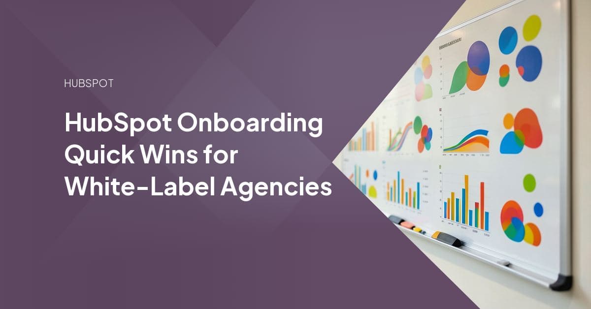 An agency team and a white-label HubSpot specialist reviewing a freshly onboarded client's portal dashboard together