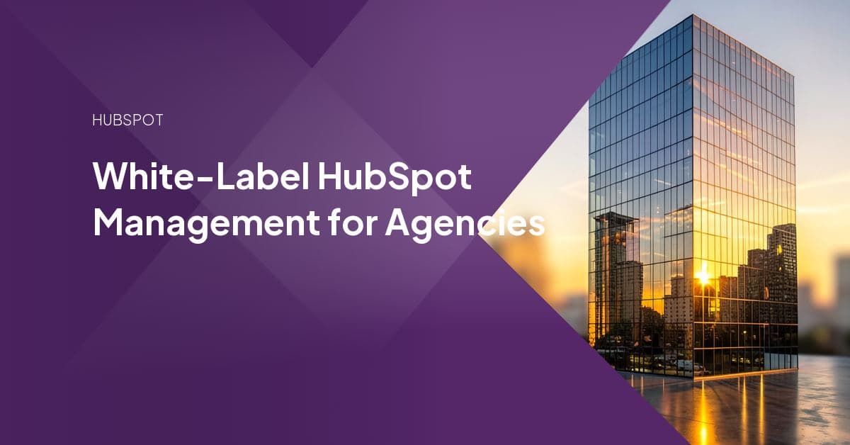 An agency team member managing a client's HubSpot portal on a laptop, representing white-label delivery work carried out behind the scenes under the agency's own brand.