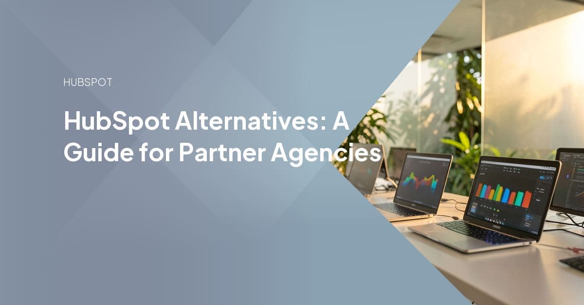 A marketing agency team reviewing platform options and capacity planning on a laptop, weighing whether to switch platforms or build out HubSpot delivery capacity.