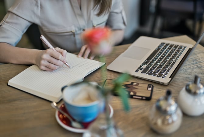 taking notes during meeting