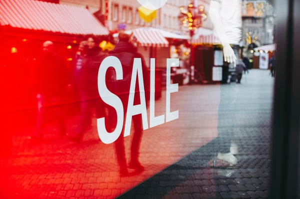 sale-sign-in-window