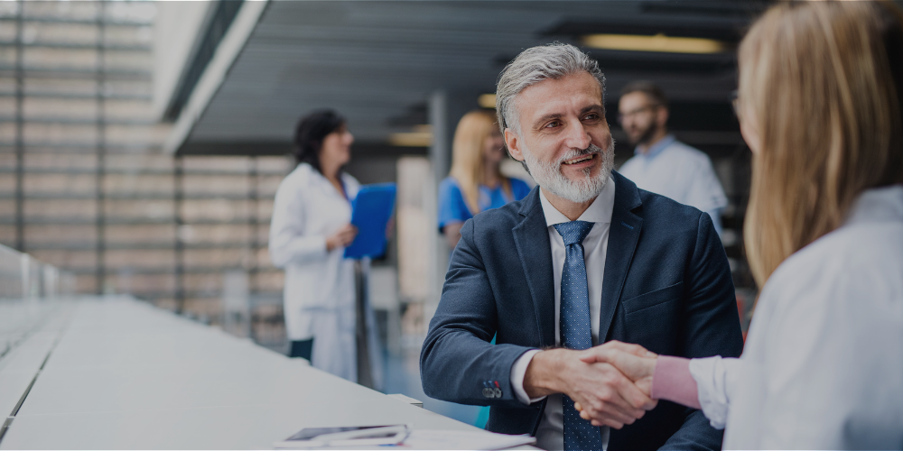 shaking hands after a sales meeting